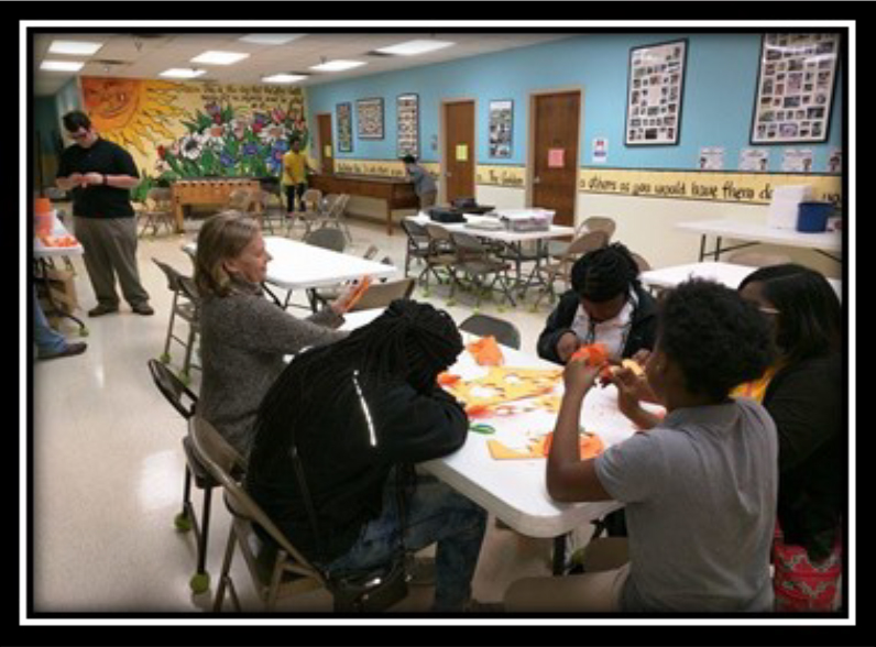 Current Grant Projects: Dyer County [4-H Mentoring Program] - Students making packages for the Stress Relief Essential Oils that are being made for the teachers