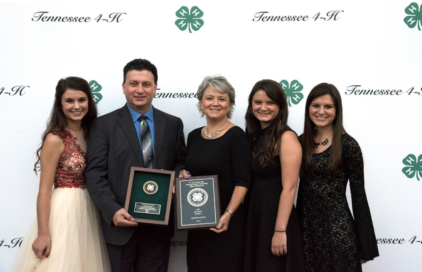 Hale Master 4-H Families Recognized - Standing from left to right, Kassidy, Craig Beasley, Missy Beasley, Kirsten, and Kayleigh