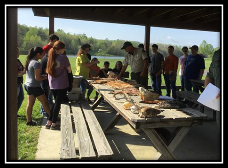 Current Grant Projects: Scott County [4-H Mentoring Program] - Youth learned about mammals, what is considered a fur bearer, the difference between non game, small game, and big game animals, and much more.