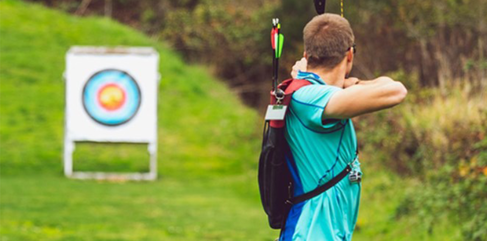 Fall Shooting Sports Jamboree - 4-H'er shooting a bow and arrow at the target.